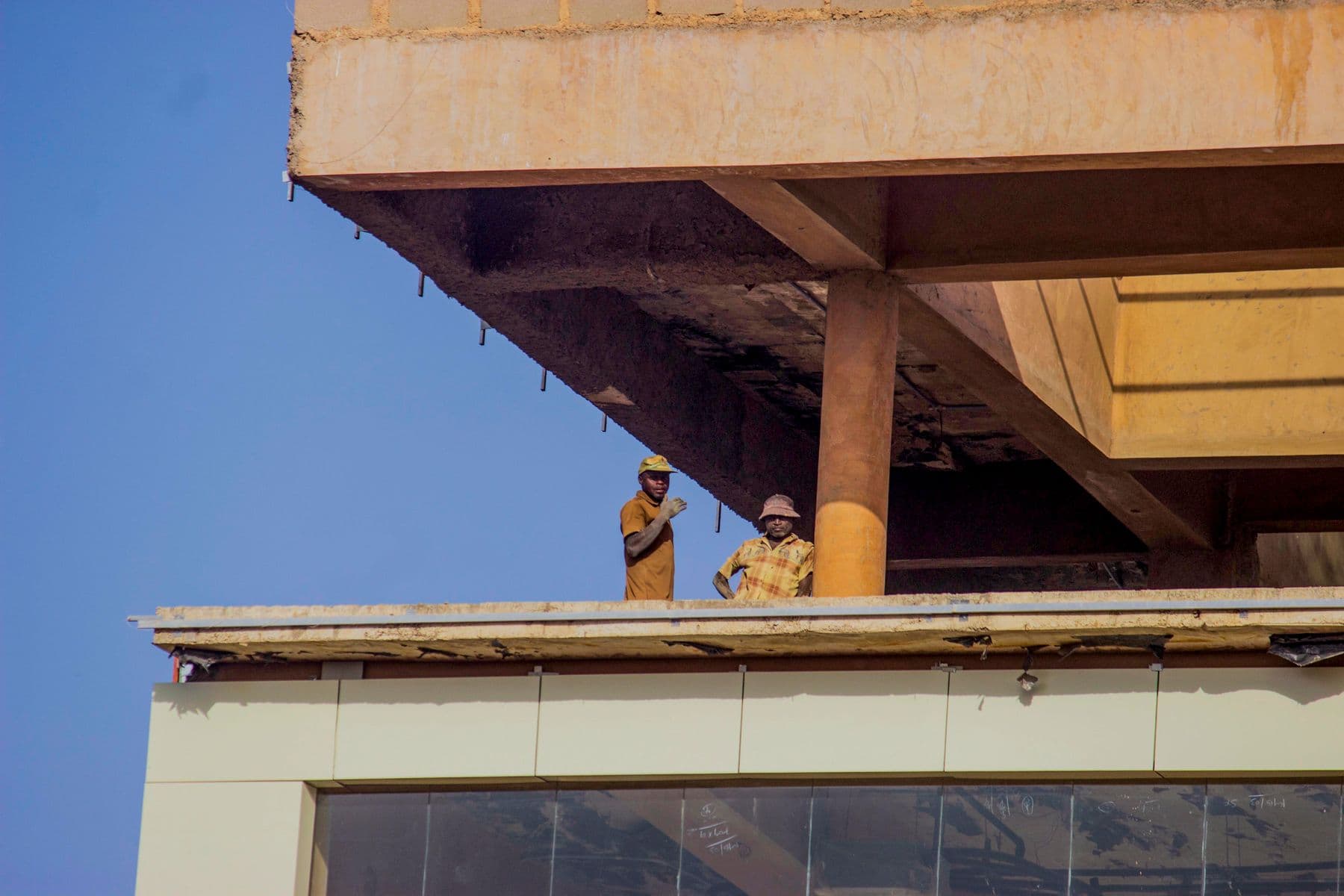 Illustrative photograph of construction workers on a building site